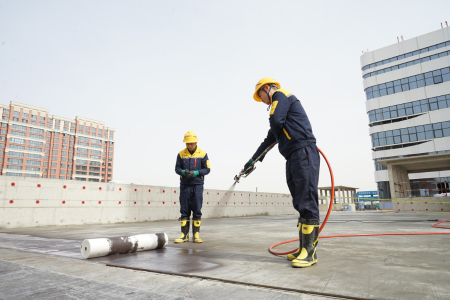 Worker on waterproofing job